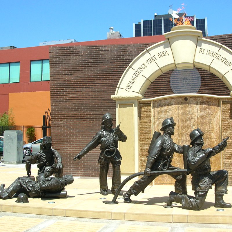 memorial fireman garden statue