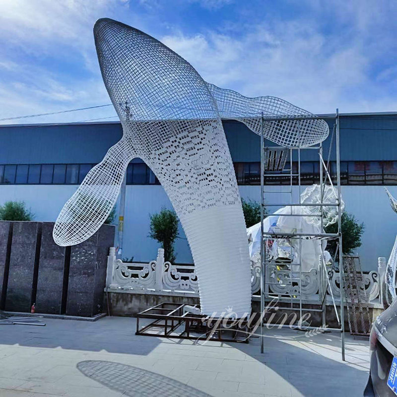 metal whale sculpture