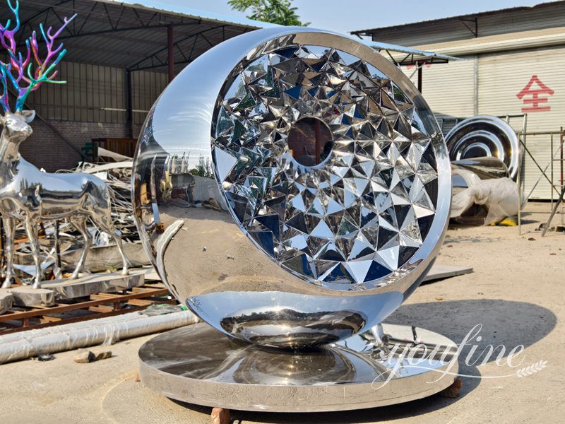 polished stainless steel ball sculpture