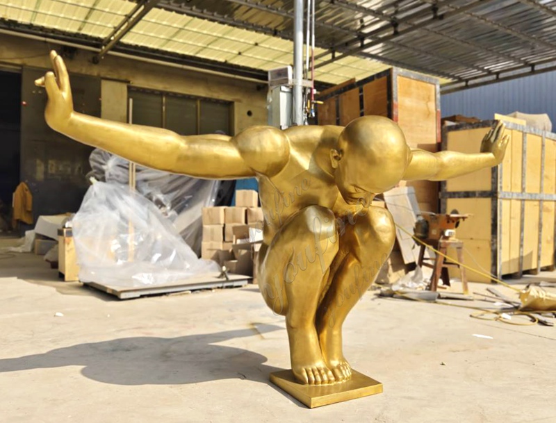 bronze diving man sculpture