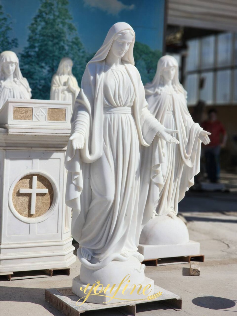 marble mother mary statue outdoor