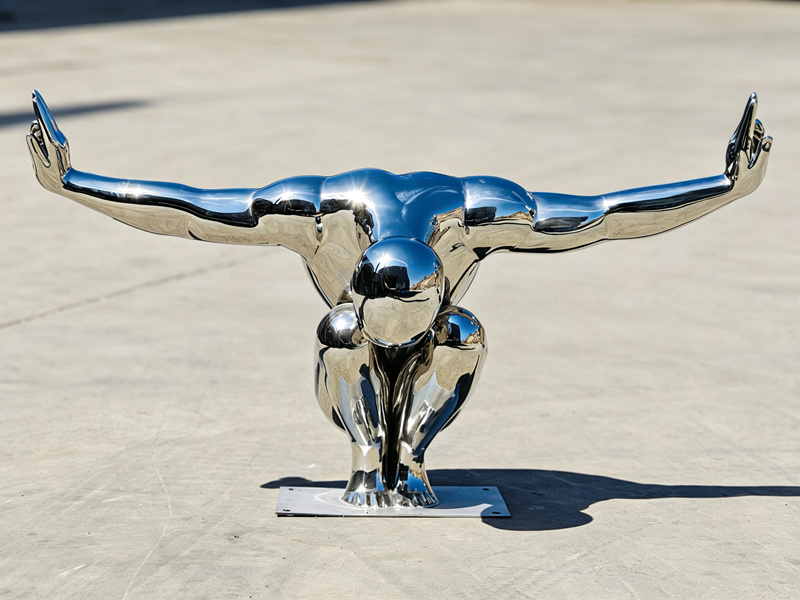 metal diving man sculpture