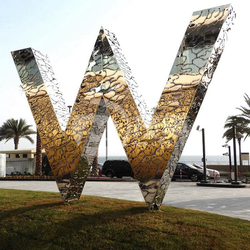 customized stainless steel “W” letter sculpture