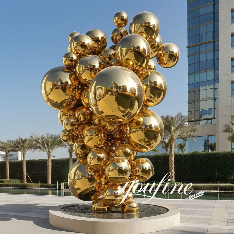 large golden metal sphere sculpture (2)