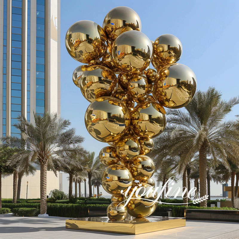 large golden metal sphere sculpture (3)
