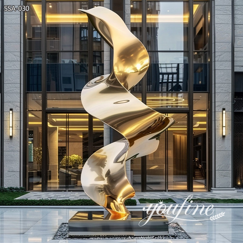 abstract golden stainless steel sculpture