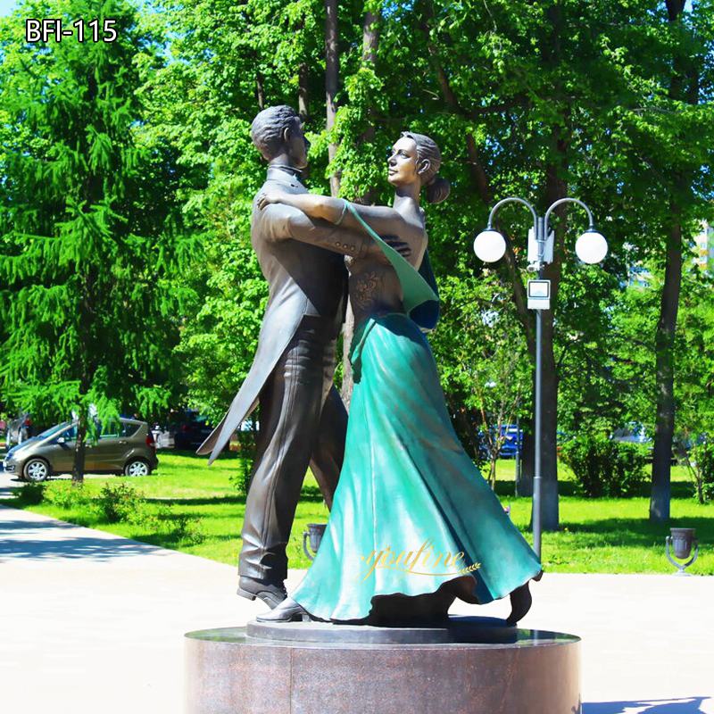 dancing couple garden statue