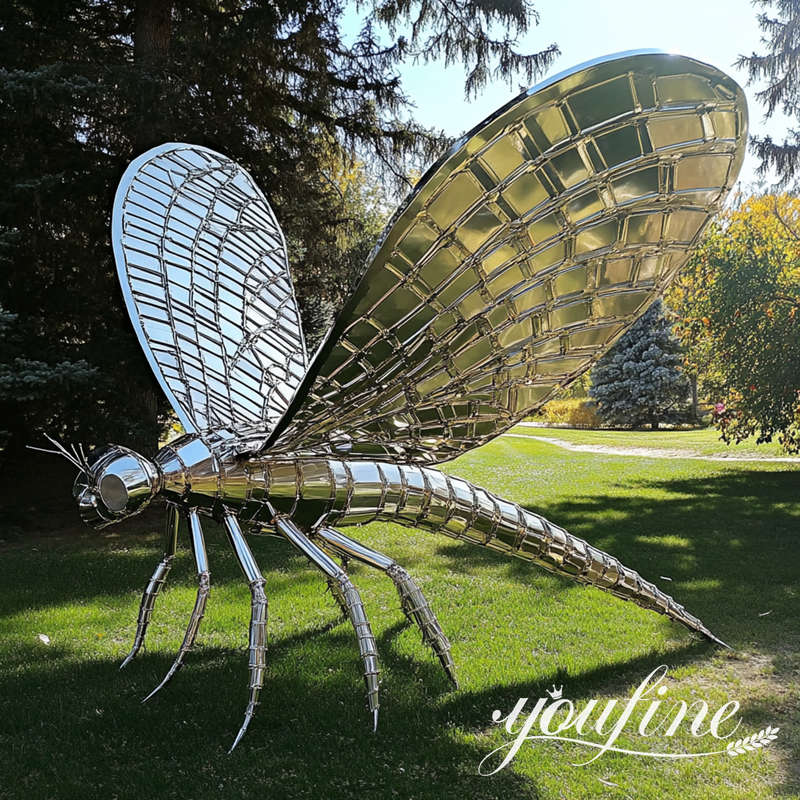mirror polished dragonfly sculpture