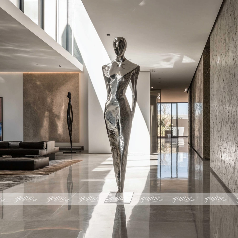 tall stainles stel abstract human figure sculpture for hallway decor