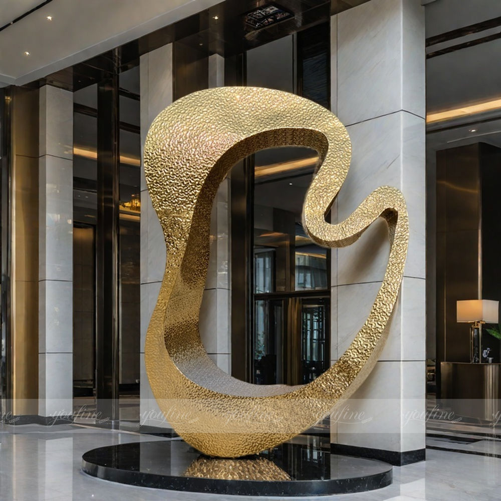 large gold metal sculpture