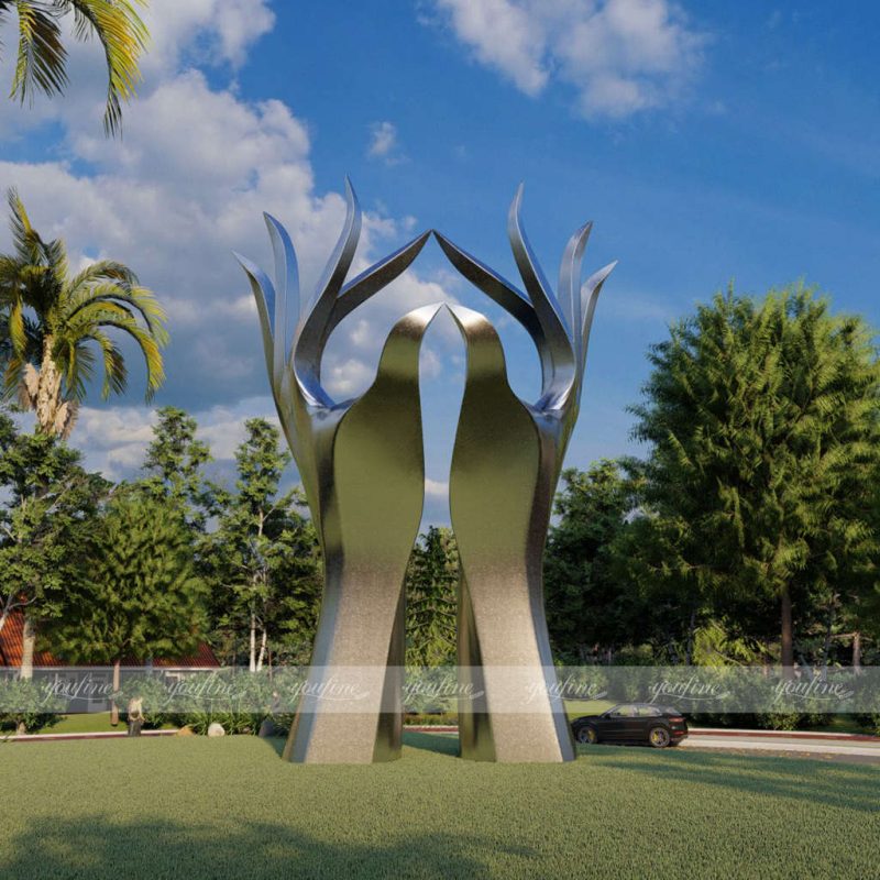 large outdoor metal hand sculpture