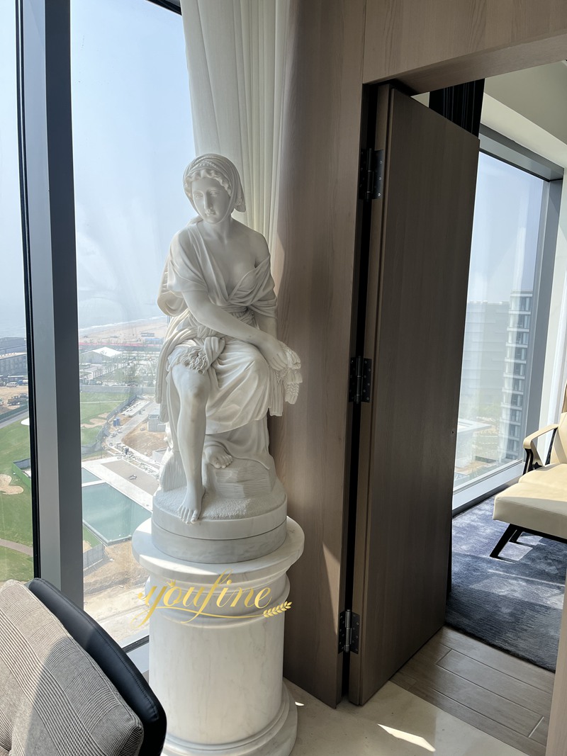 sitting lady statue