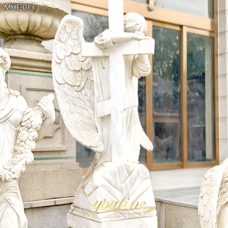 gravestone angel with cross memorial