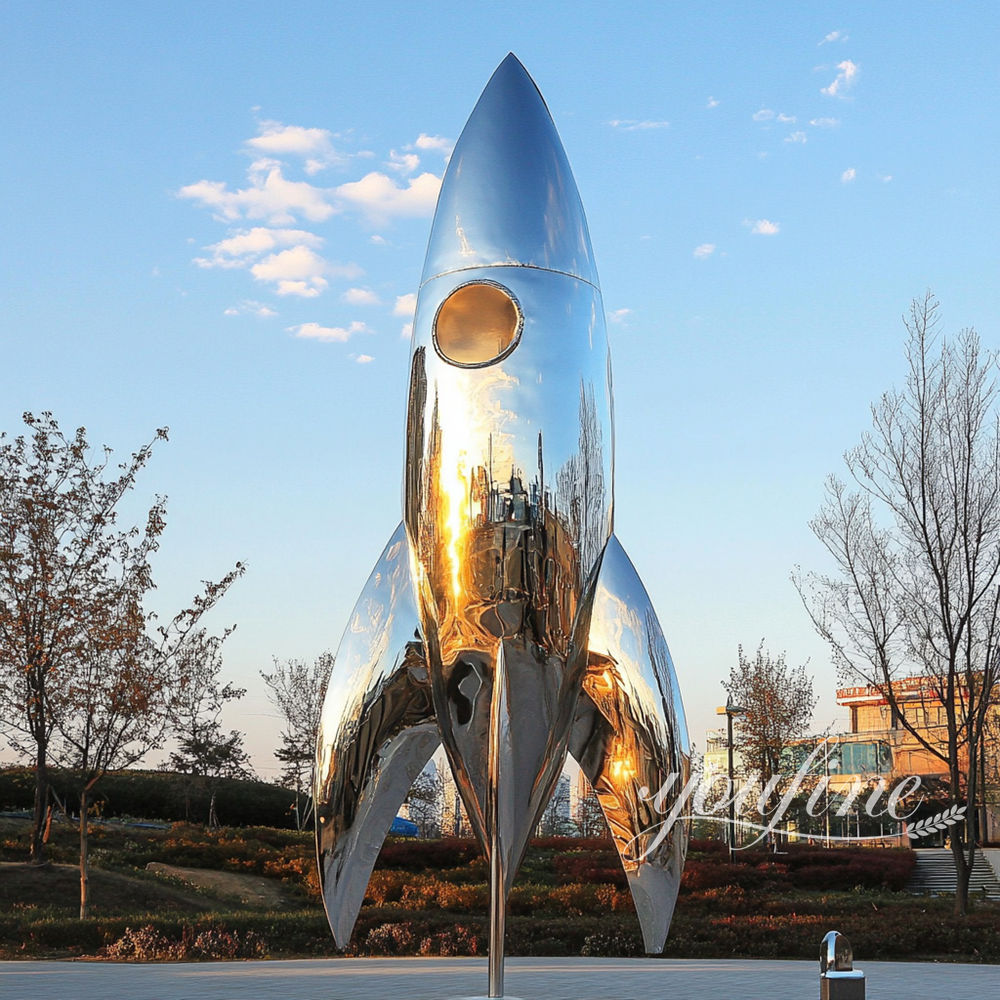 high polished metal rocket sculpture