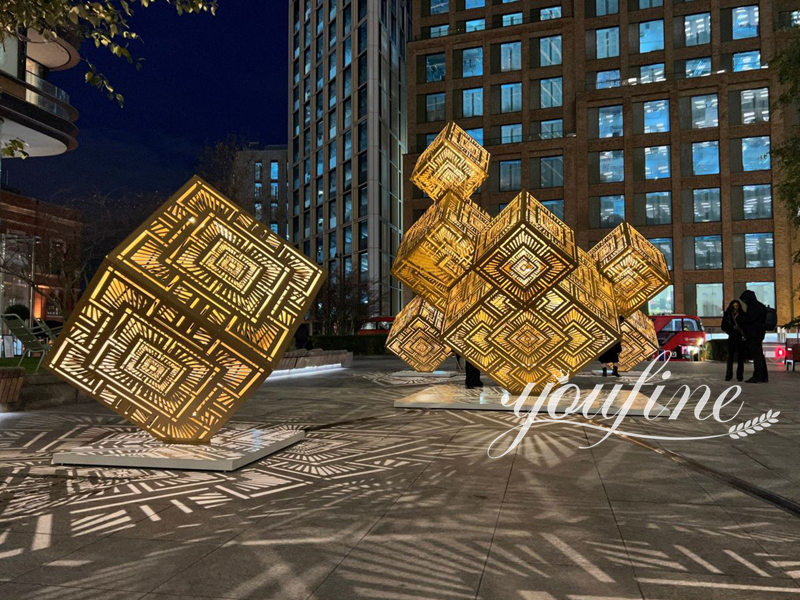 striking illuminated geometric sculpture in stainless steel 