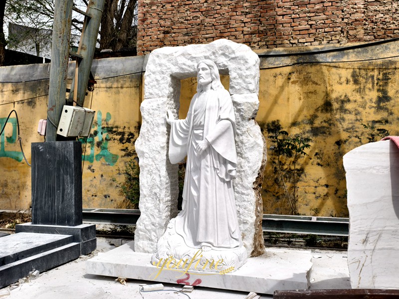 Marble Jesus leaning on column