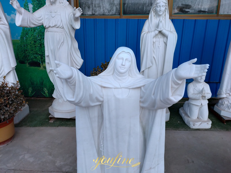 Marble female saint statue