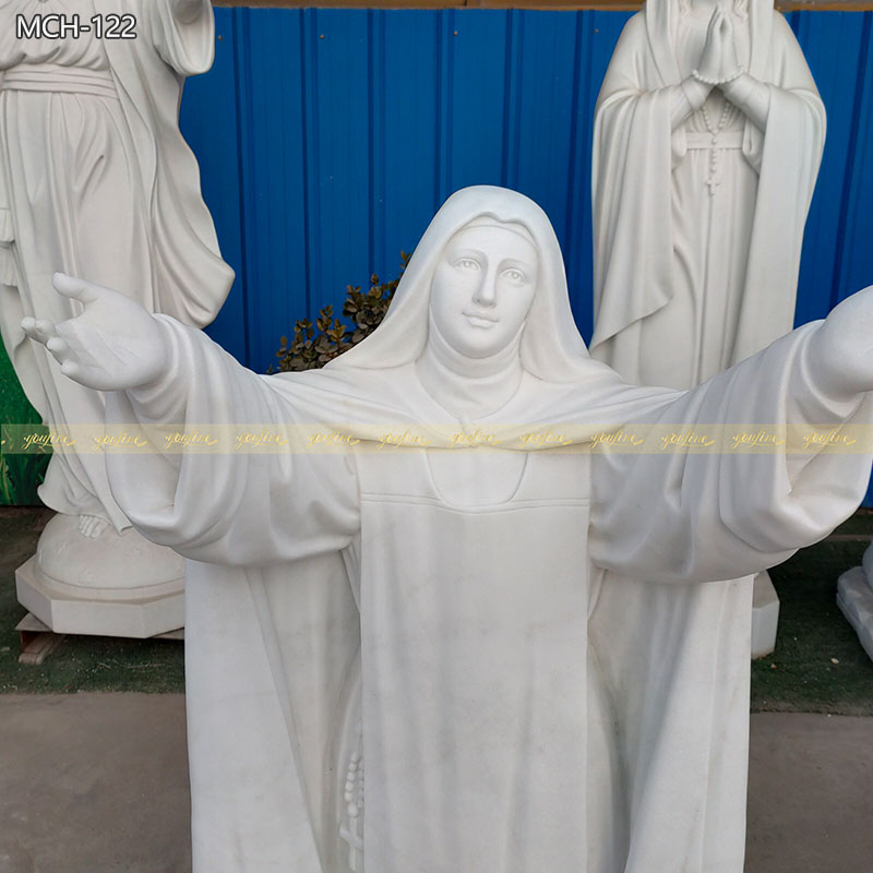 White Marble female saint statue details