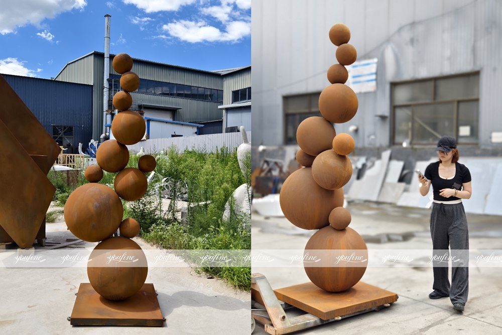 finished corten steel sphere sculpture
