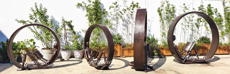 Abstract Man Reading Sculpture Inside A Circle