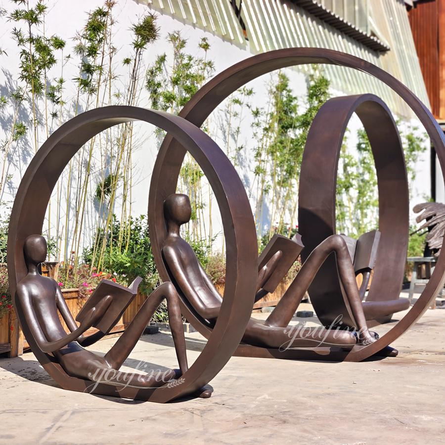 Bronze Abstract Man Reading Sculpture Inside A Circle