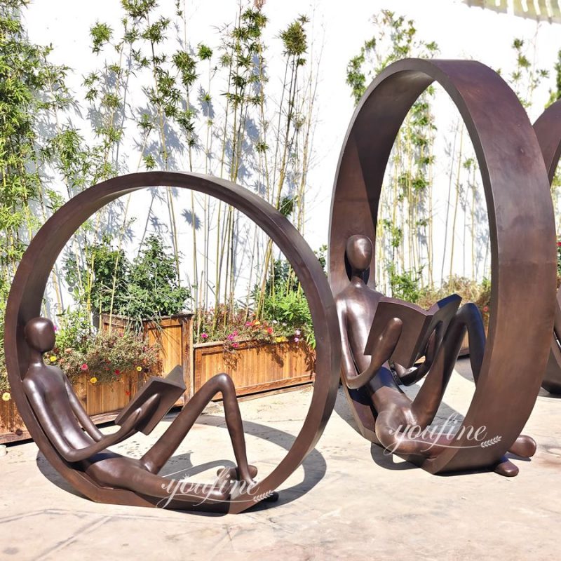 Bronze Man Reading Sculpture Inside the Ring