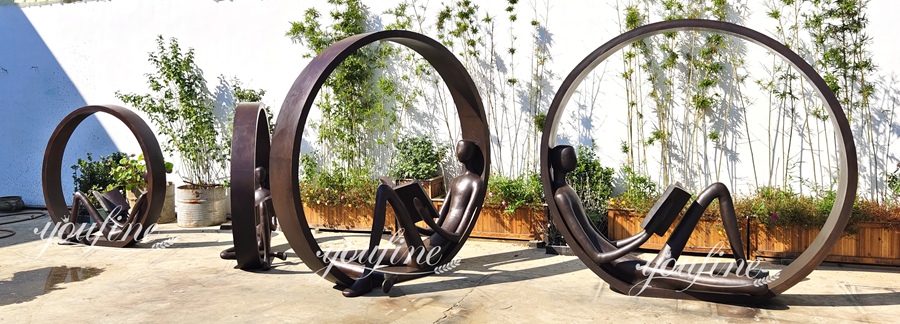 Bronze Reading Sculpture Inside the Ring