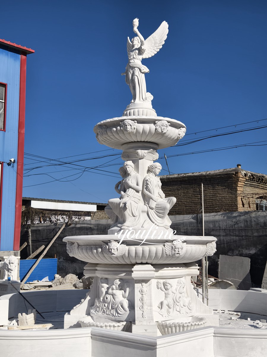 Elegant white angel sculpture fountain