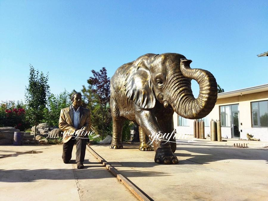Elephant and uncle sculpture