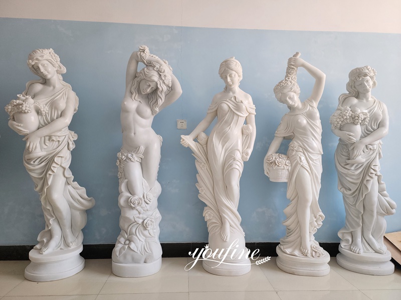 Group of five classical marble female figures in different standing poses