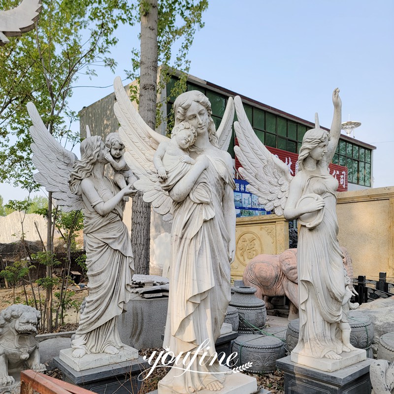 garden angel and baby statues