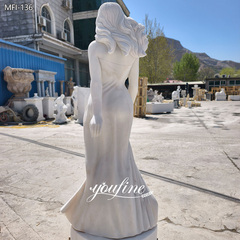 white marble female statue