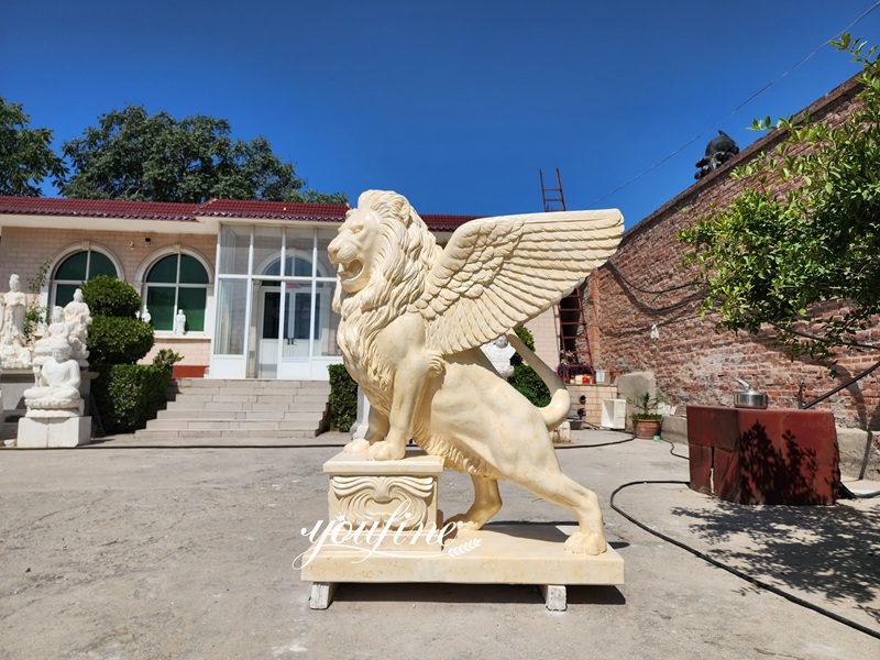 Golden marble winged lion garden statue for Manor