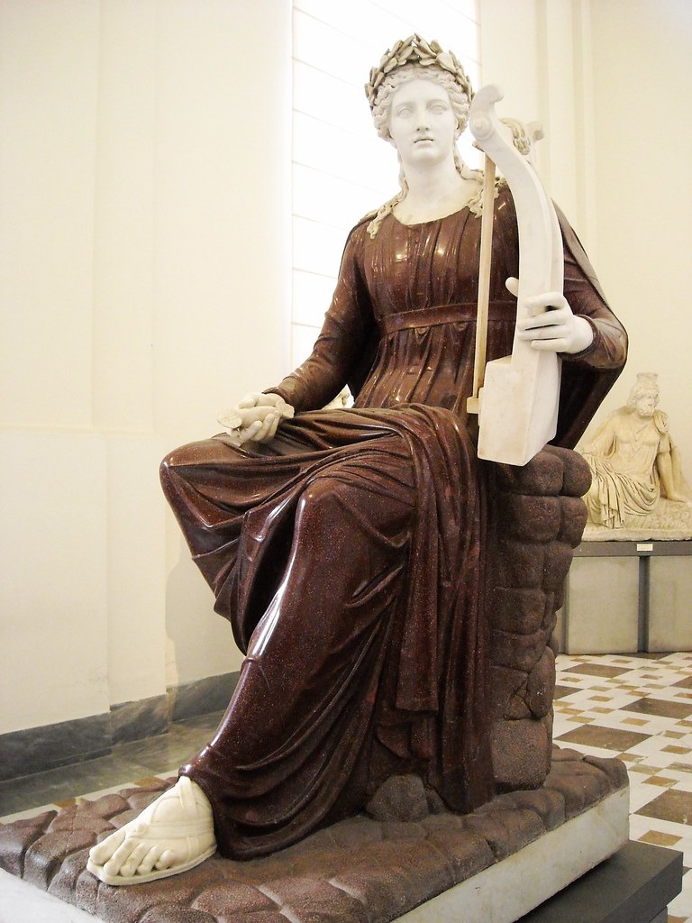 famous Apollo seated with a lyre