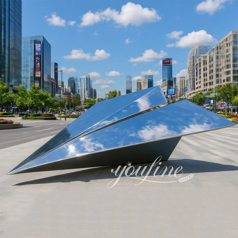 modern paper airplane sculpture