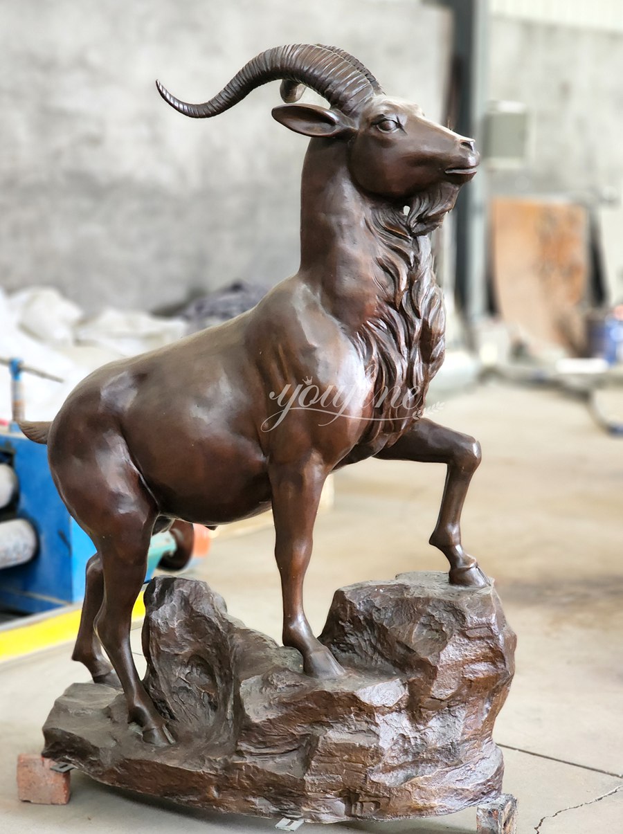 garden mountain goat statue