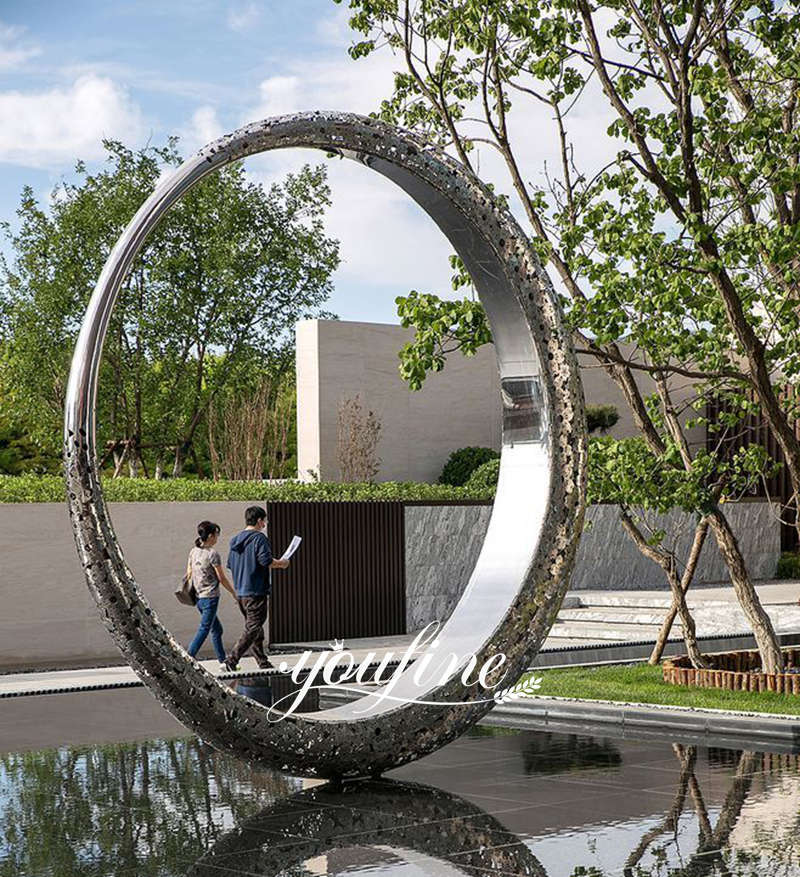 outdoor stainless steel circular sculpture