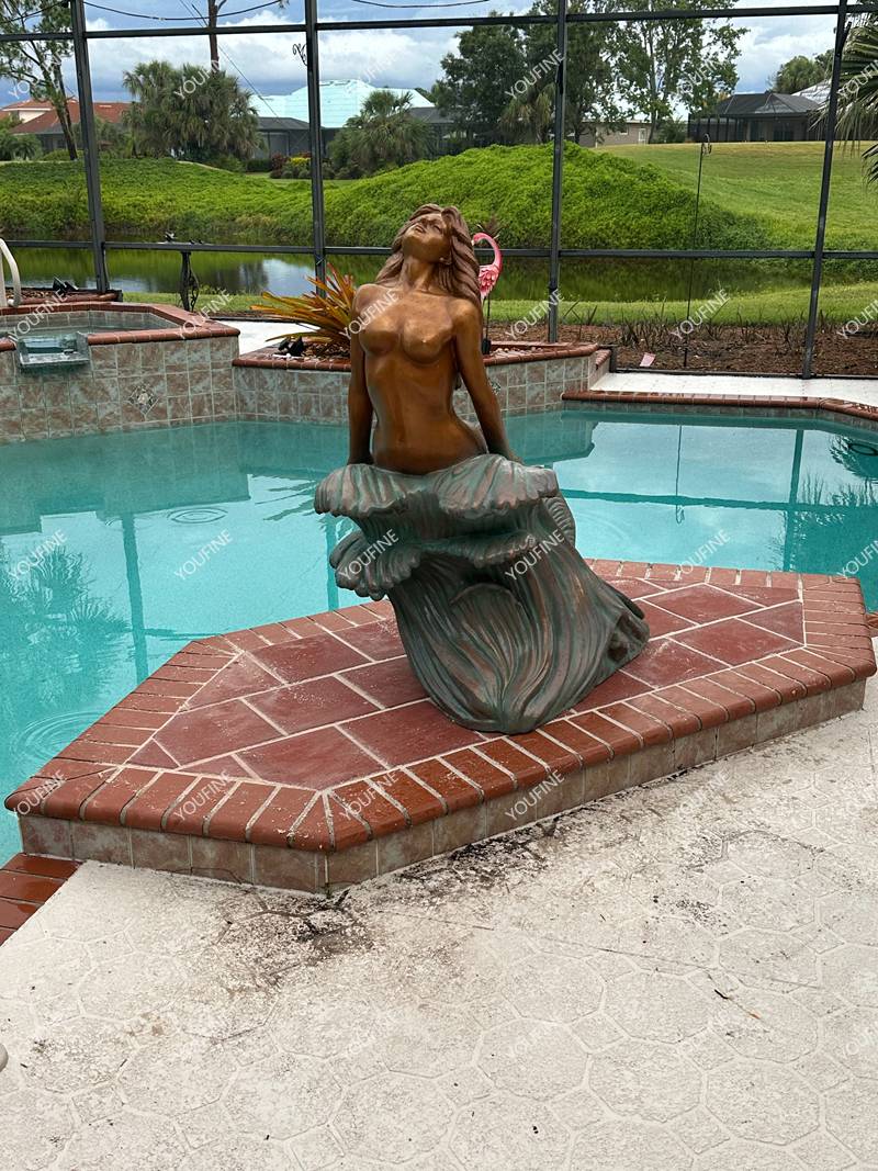 The Elegant Mermaid at the Poolside Corner