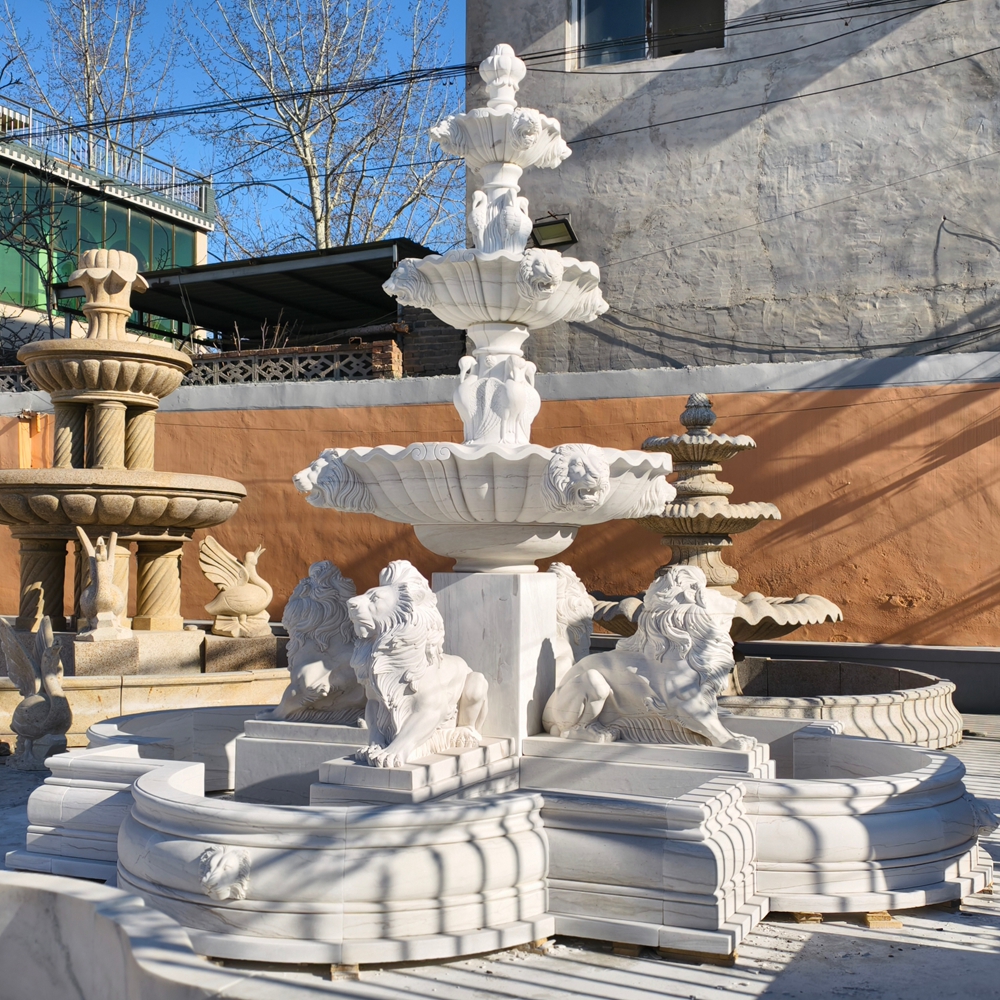 marble Sitting lion sculpture with a irregular pool tiered fountains