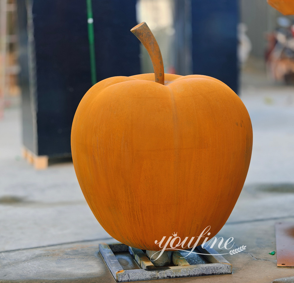 corten steel big apple sculpture