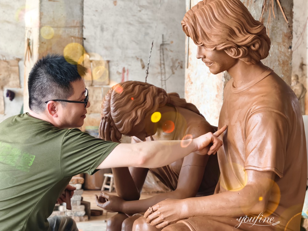 bronze sculpture made of The artist refining the details