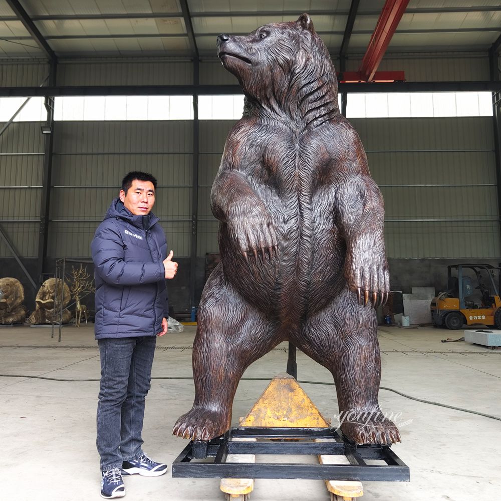 Standing Bronze Bear statue and Our QC Manager