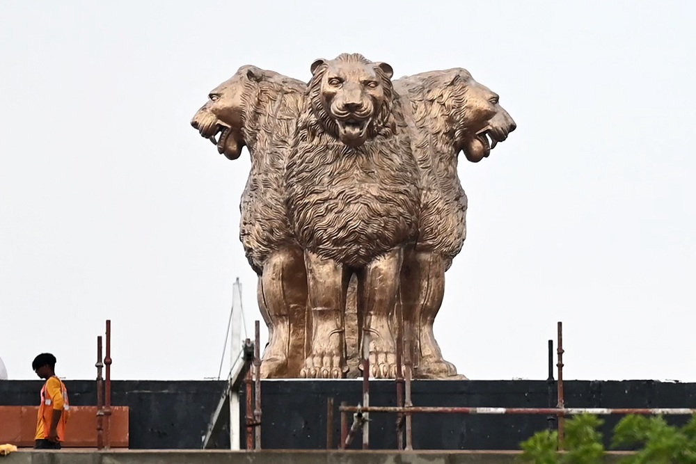 The bronze sculpture of four lions atop the Ashoka Pillar