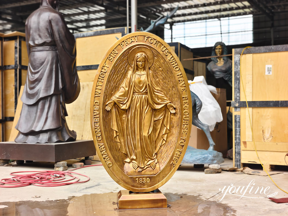 bronze virgin mary relief 