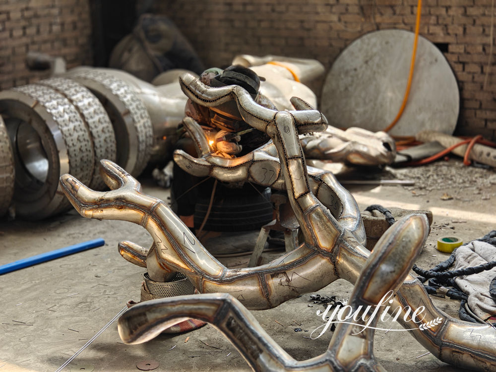 hand welding of metal tree sculpture