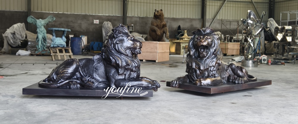 bronze lying lion statue