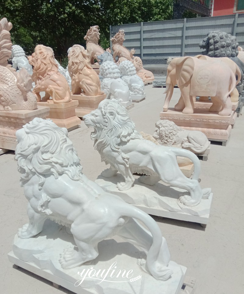 marble walking lion statues