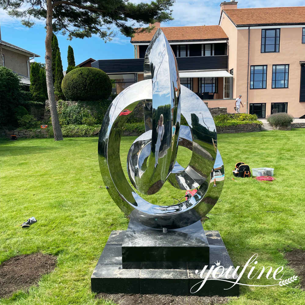 abstract stainless steel garden sculpture