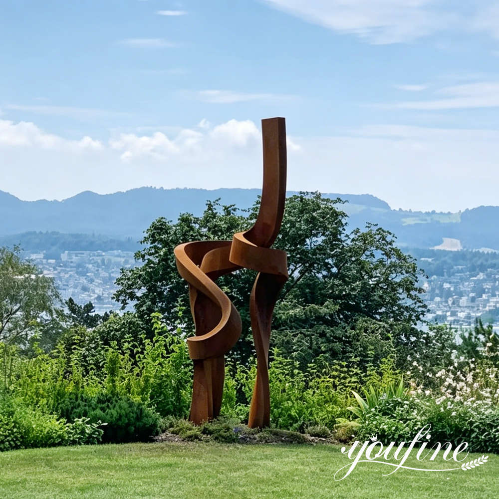 Large corten steel artwork delivered for a residential landscape project in Switzerland.