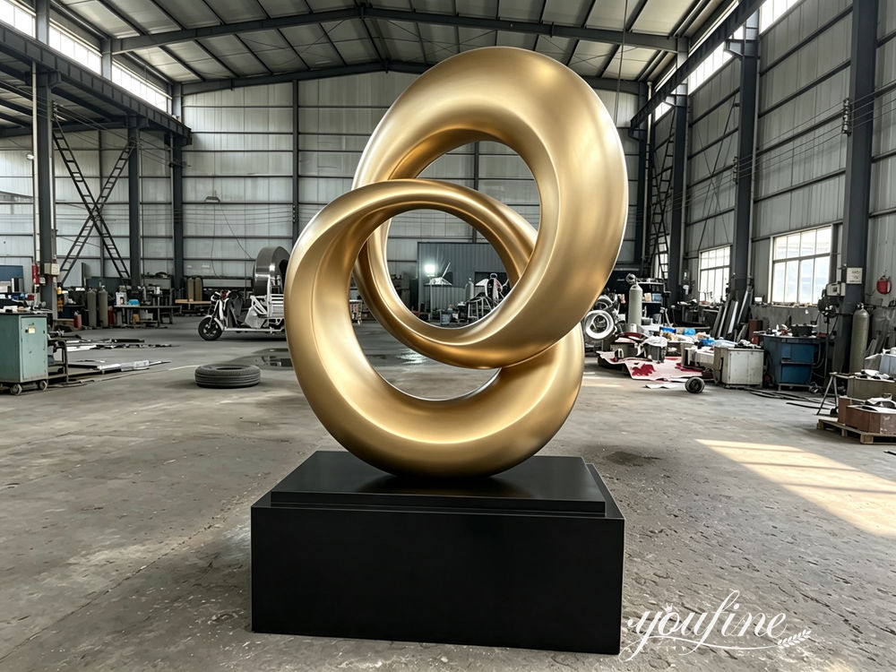 stainless steel gold sculpture